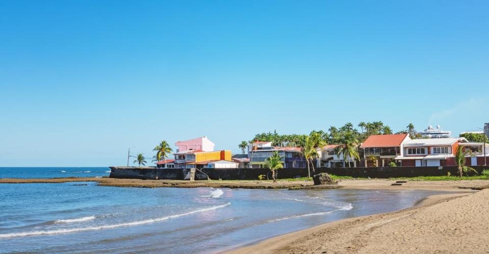 beautiful views of the city of puerto limon along the streets that run alongside the sea