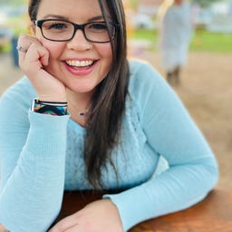 A headshot of writer Aly J Yale.