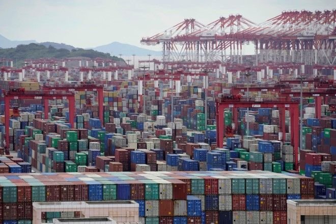 China’s economic woes mount as trust firm misses payments, home prices fall