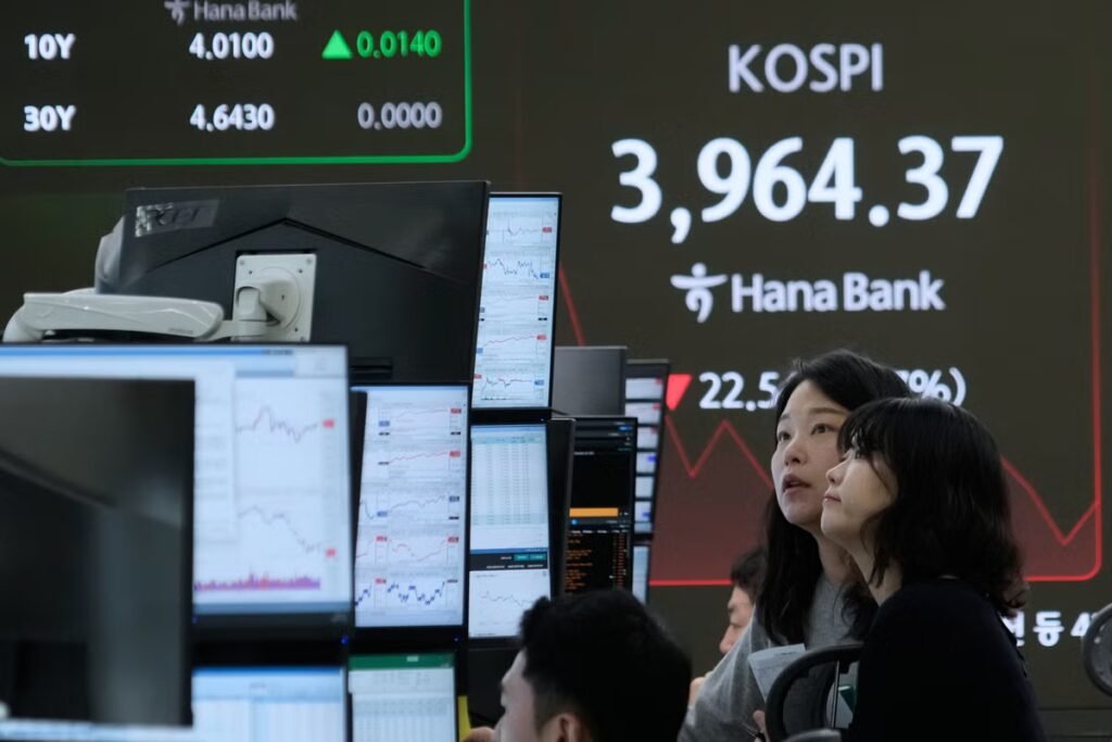 Asian shares are mixed in holiday-thinned trading with Wall Street closed for Thanksgiving