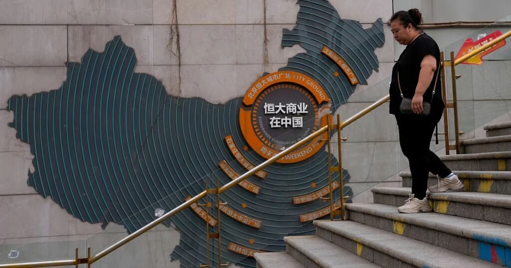 China moves to wrap up saga of troubled property giant Evergrande after founder gets life sentence